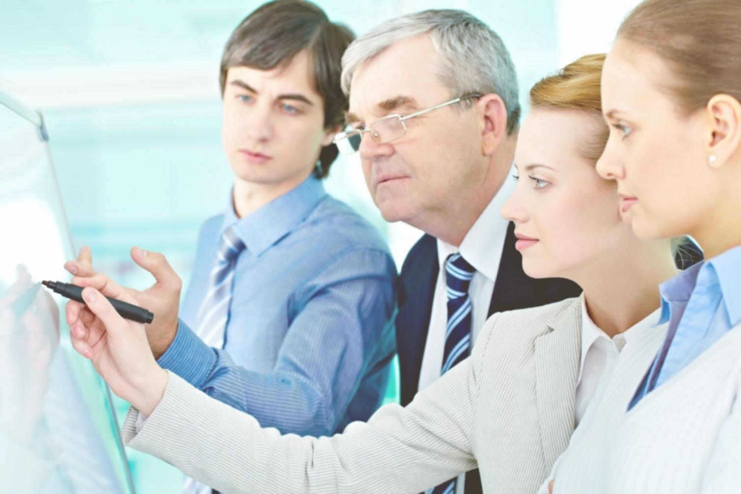 Financial analysis meeting with business owner reviewing statements